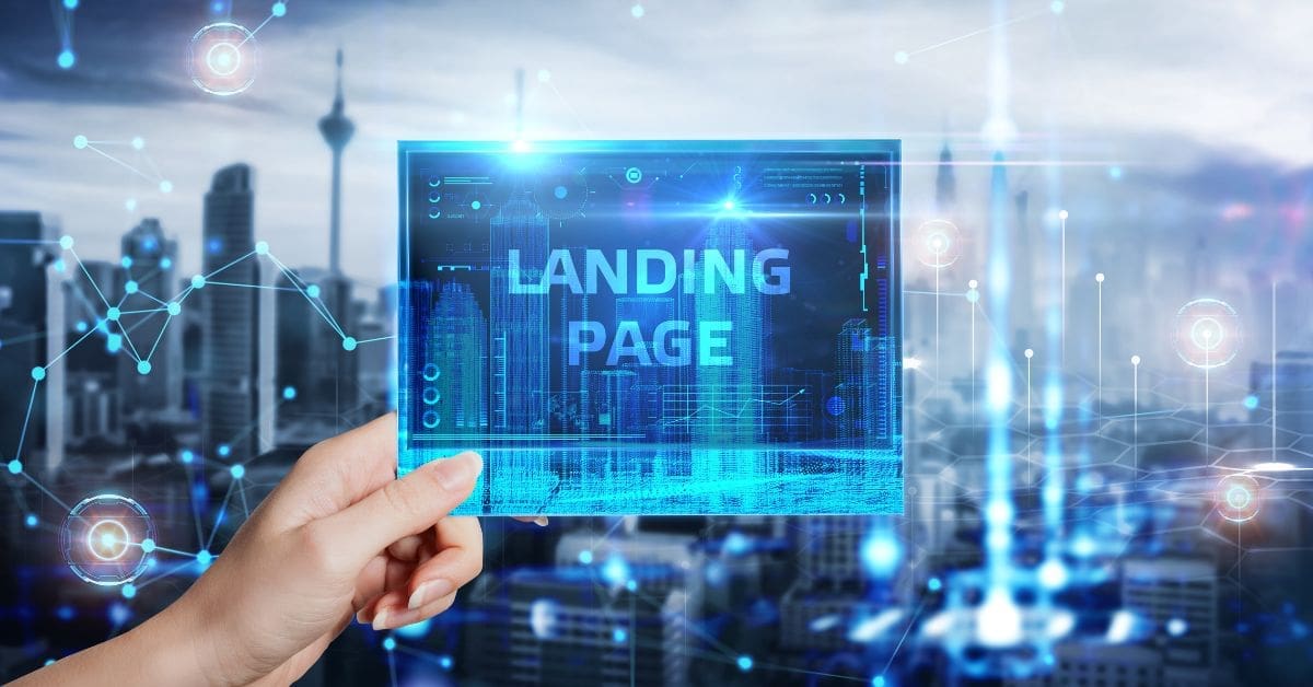 hand holding a blue screen with landing page written on it
