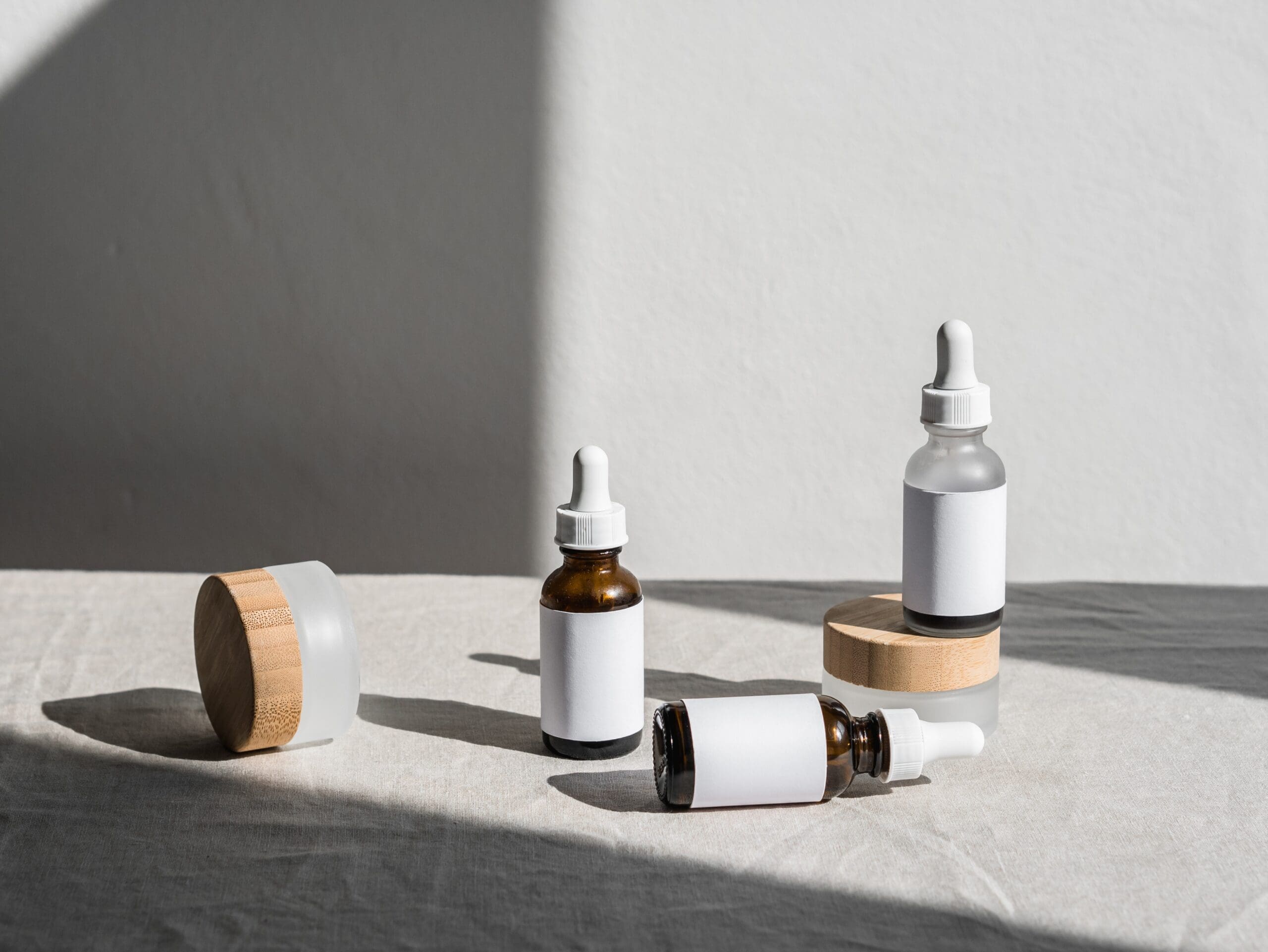 boxes and vials without labels on a white surface